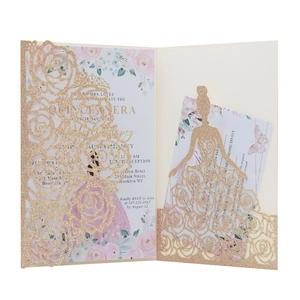 Detail of laser-cut rose and princess dress invitation set with glitter champagne finish