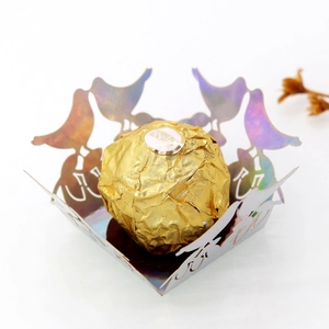 Laser cut laser silver hollow bird candy box with Ferrero Rocher chocolate display