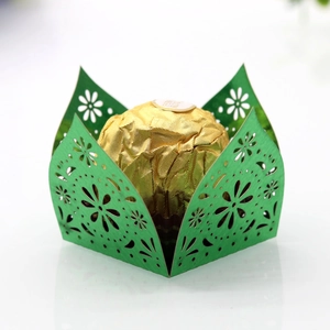 Detail showing green laser-cut hollow lace design for chocolate party favor boxes