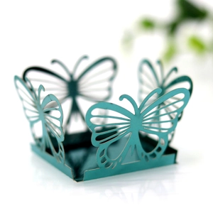 Detailed laser-cut teal gift box with intricate hollow butterfly design for weddings