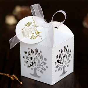 White laser cut Tree of Life favor box with ribbon and gold foil Thank You tag