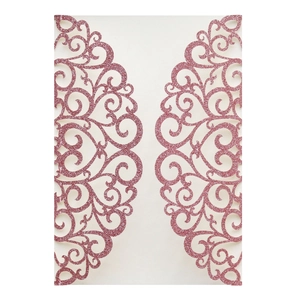 Detail of pink laser-cut invitation sleeve with glitter finish and floral hollow patterns