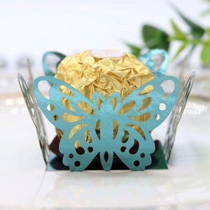 Detailed laser-cut butterfly hollow chocolate lace wrapper in elegant mint green