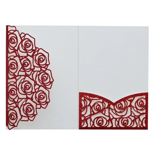 Detail view of red glitter laser cut rose pattern wedding invitation card holder cover