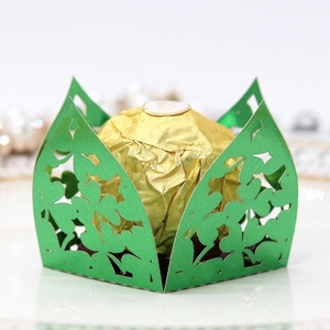 Hollow green clover chocolate box made of mirror paper for party and festive decoration