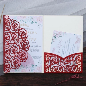 Macro view of red glitter laser-cut rose invitation with elegant card set details
