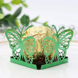 Detailed laser-cut green butterfly candy favor box made of shimmering pearlescent paper