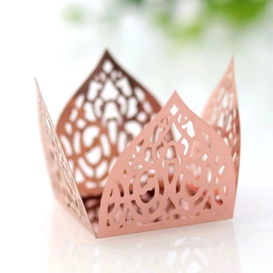 Detail showing rose gold laser-cut镂空 lace cupcake wrapper for party table decoration