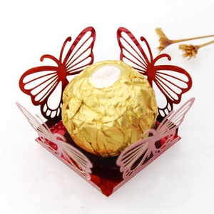 Laser-cut red butterfly chocolate holder with intricate hollow patterns for wedding decor