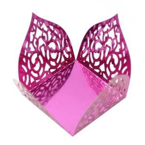 Detailed laser-cut vine patterns on metallic rose red hollow candy box with floral edges