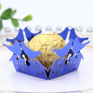 Blue laser-cut bird design candy tray made of pearlescent paper for wedding decor