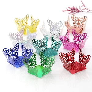 Detail of laser cut butterfly cupcake wrappers in various metallic pearlescent colors