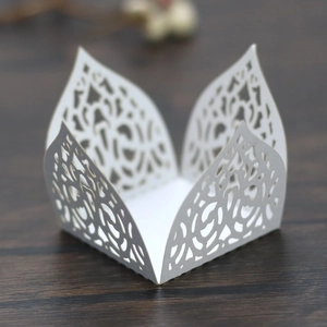 Detailed laser-cut white hollow lace paper candy box for wedding and party favor decoration