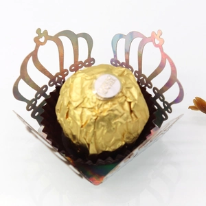 Laser-cut crown favor box in holographic paper for candy and chocolate party decor