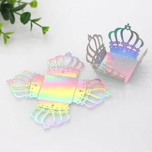Laser cut holographic crown candy box showing flat and folded states on white background