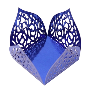 Top view of bright blue laser-cut decorative gift box with intricate floral patterns