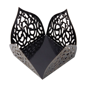 Detailed laser-cut black mirror paper candy box with intricate vine patterns for parties