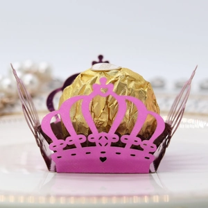 Detail showing pink laser-cut crown candy box with hollow heart base for chocolates