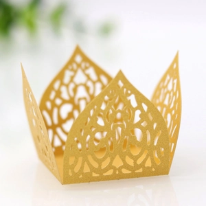 Intricate laser-cut gold lace cake wrapper with crown patterns for wedding party decor
