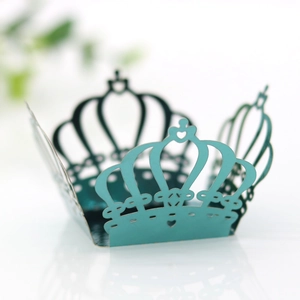 Detailed laser-cut crown candy box with intricate heart patterns in tiffany blue paper