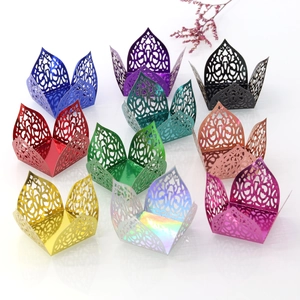Detailed view of laser-cut mirror paper cupcake wrappers in various pearlescent colors