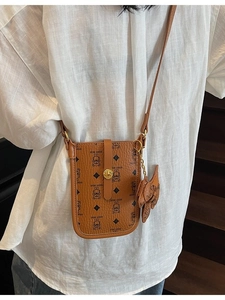 Brown Keidy Bear crossbody phone bag with classic monogram print and bear charm