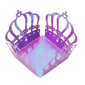 Detail of laser-cut crown cupcake wrapper in iridescent purple laser finish for party decoration