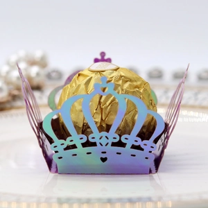 Macro detail of laser-cut crown candy box with iridescent holographic mirror finish