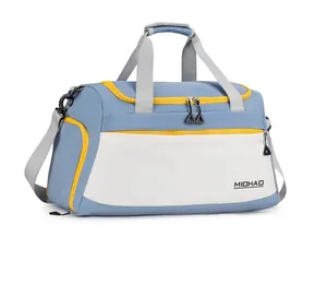 Detail view of large sport bag showing multi-pocket design and nylon stitching