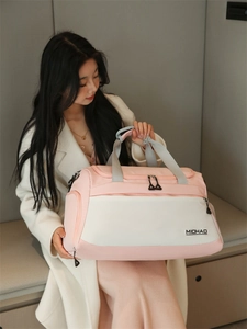Pink and beige waterproof sports duffle bag for travel and gym with dry wet separation