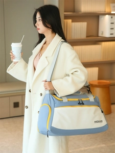 Waterproof large capacity travel duffel bag with stylish blue and yellow color block design