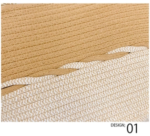 Detail of a woven straw tote bag featuring camel and white herringbone fiber patterns