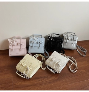 Mini sacs à dos pour femmes aux couleurs pastel avec nœud et détail chaîne perlée