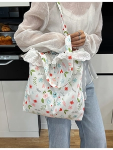 Women's floral canvas tote bag with lace trim and elegant pattern for daily commute