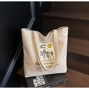 Detailed view of the Moon and Sixpence canvas tote bag with artistic graphic print