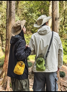 Outdoor camping set featuring a wide-brim sun hat and a lightweight drawstring crossbody bag
