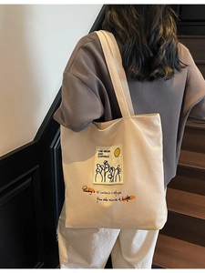 Large capacity canvas tote bag for women with Moon and Sixpence quote print in white