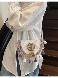 Bohemian handwoven white crossbody bag with purple floral embroidery and tassels