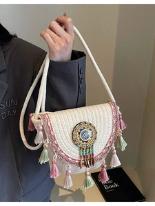 Bohemian woven half-moon crossbody bag with colorful bead embroidery and long fringe tassels