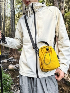 Lightweight yellow nylon drawstring crossbody sports bag for outdoor hiking and commuting