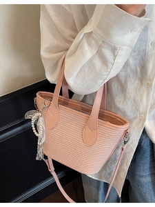 Sac fourre-tout en paille rose avec nœud en dentelle et bandoulière en similicuir