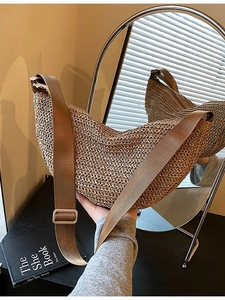 Handcrafted dark khaki woven crossbody bag with a minimalist half-moon beach style design