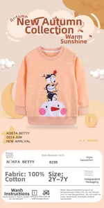 Detail of 100% cotton kids sweatshirt featuring embroidered penguins and white polka dots