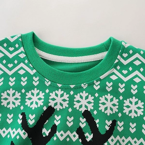 Green Christmas sweatshirt for boys featuring festive reindeer antlers and snowflake prints