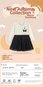 Détail du haut en coton avec broderie panda et jupe en tulle brillant pour fille