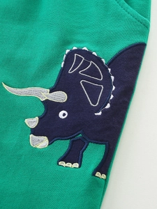 Pantalon de jogging en coton vert pour garçon avec broderie détaillée de tricératops