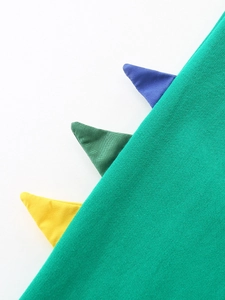 Pantalon de jogging vert pour garçon avec des ailerons de dinosaure 3D colorés sur le côté