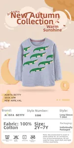 Close-up of grey long-sleeved cotton T-shirt featuring green dinosaur graphic prints