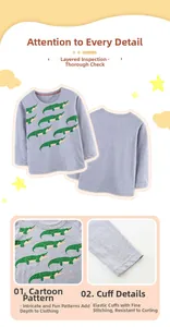 Close-up of dinosaur prints, elastic cuffs, and fine stitching on boy's cotton t-shirt