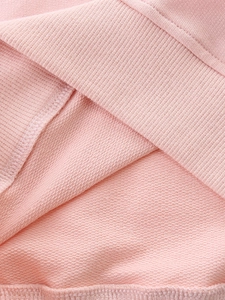 Pink girls sweatshirt with rabbit embroidery showing rib knit cuffs and soft terry lining